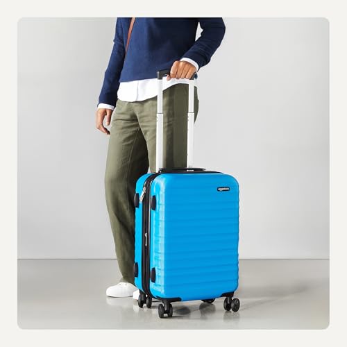 Amazon Basics 21" Hardside Carry-On Luggage with Expandable Space, Scratch-Resistant Surface, Telescoping Handle, Four Multi-directional Wheels, Light Blue view 3
